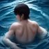 内容审核员王浩然的职业照，男性，商务休闲风格，坐在明亮办公室内，桌上摆有多台显示器